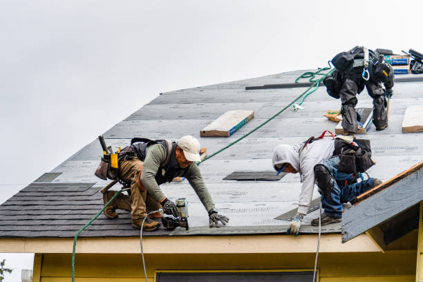 Professional Gutter Installation technician working in Cliffside Park, NJ